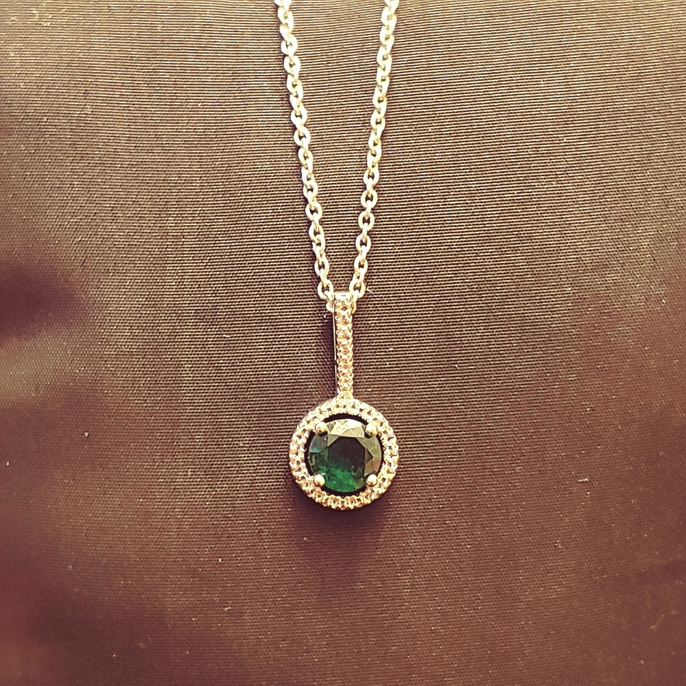 Round Emerald pendant on silver chain